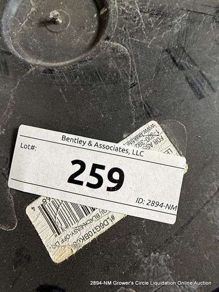 BLACK TOTE FULL OF LIDS