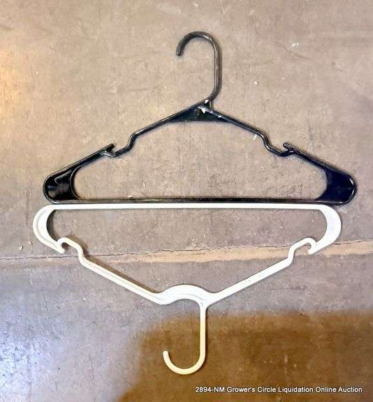 BLACK TOTE FULL OF HANGERS