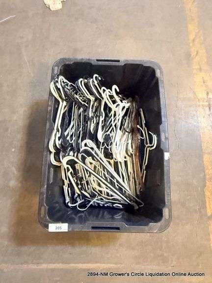 BLACK TOTE FULL OF HANGERS