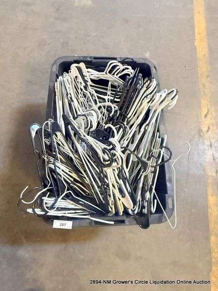 BLACK TOTE FULL OF HANGERS