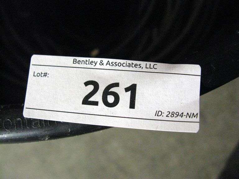 BLACK BRUTE TRASHCAN W/ MISC. CABLE