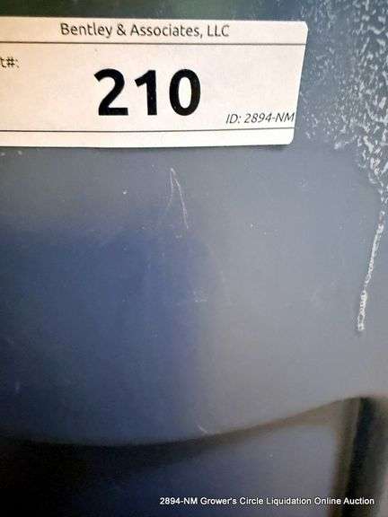 LARGE TRASH BIN FULL OF HANGERS