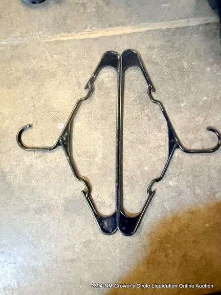 BLACK TOTE FULL OF HANGERS