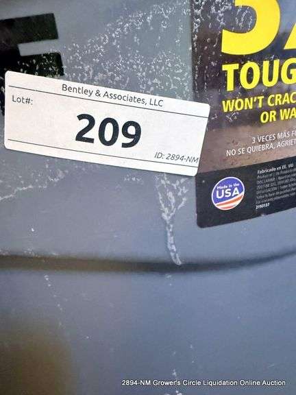 SMALL TRASH BIN FULL OF HANGERS