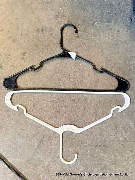 BLACK TOTE FULL OF HANGERS