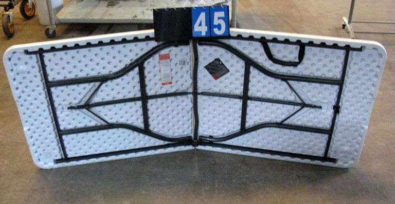 WHITE PLASTIC FOLDING TABLE