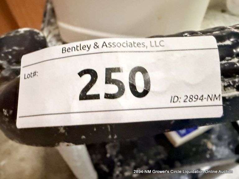 BLACK CART ON WHEELS W/ MISC. ITEMS