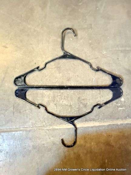 BLACK TOTE FULL OF HANGERS