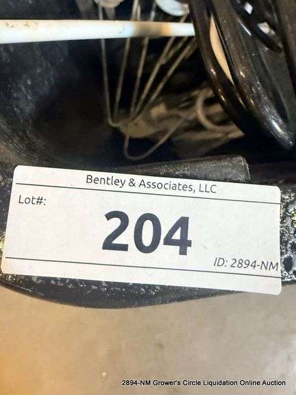 BLACK TOTE FULL OF HANGERS