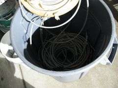 BRUTE PLASTIC TRASHCAN W/ MISC. ITEMS