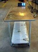 METAL STAINLESS TABLE ON WHEELS, 5' X 3' X 3'