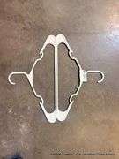 LARGE TRASH BIN FULL OF HANGERS