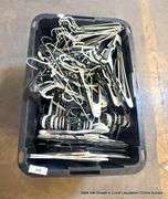 BLACK TOTE FULL OF HANGERS