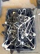 BLACK TOTE FULL OF HANGERS