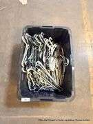 BLACK TOTE FULL OF HANGERS