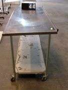 METAL STAINLESS TABLE ON WHEELS, 5' X 3' X 3'