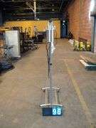 SILVER GARMENT RACK W/ CAN HEATERS