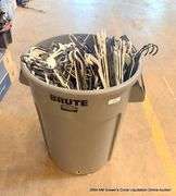 LARGE TRASH BIN FULL OF HANGERS