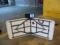 WHITE PLASTIC FOLDING TABLE