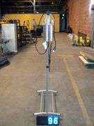 SILVER GARMENT RACK W/ CAN HEATERS