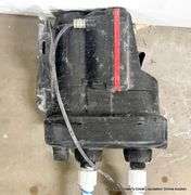 BLACK TOTE W/ MISC. ITEMS AND WATER PUMP