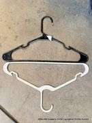 BLACK TOTE FULL OF HANGERS