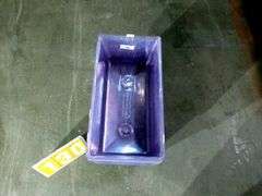 STACK OF CLEAR PLASTIC STORAGE BINS