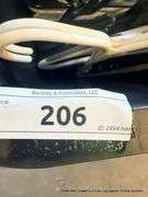 BLACK TOTE FULL OF HANGERS