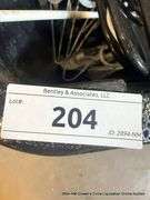 BLACK TOTE FULL OF HANGERS