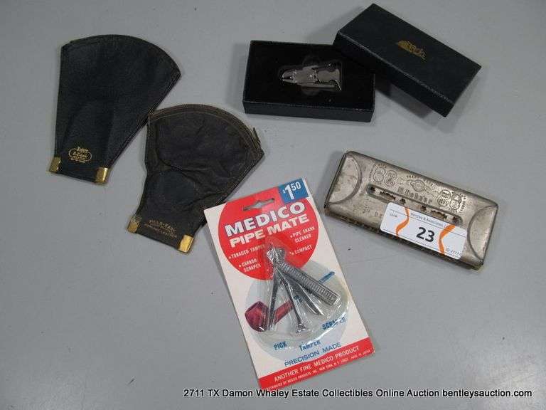 LOT: BROG PIPE EAMER W/ CASE, MEDICO PIPE MATE - UNOPENED, M. HOHNER ECHO HARMONICA, (2) LEATHER TOB