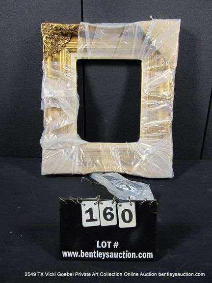 GOLD PAINTED, W/ LINEN INLAY, CARVED ORNATE WOODEN FRAME - (WRAPPED IN PLASTIC) 21 X 24