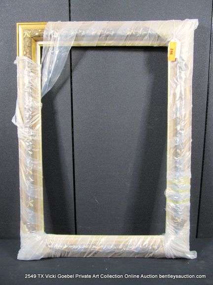 GOLD PAINTED, CARVED ORNATE WOODEN FRAME - (WRAPPED IN PLASTIC) 27 X 37