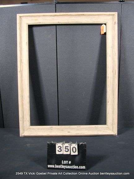 WHITE & GOLD-WASHED, CARVED WOODEN FRAME 34 X 42