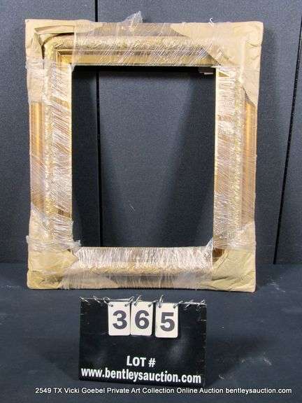 GOLD PAINTED, CARVED ORNATE WOODEN FRAME (WRAPPED IN PLASTIC) 24 X 28