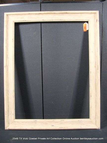 WHITE & GOLD-WASHED, CARVED WOODEN FRAME 34 X 42