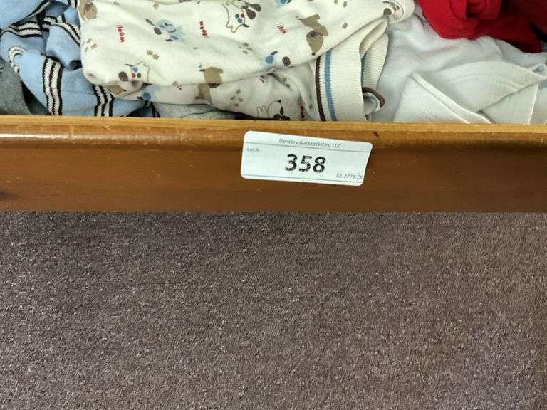 CONTENTS OF DRAWER: MISC BABY CLOTHES
