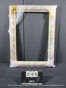 GOLD PAINTED, CARVED ORNATE WOODEN FRAME - (WRAPPED IN PLASTIC) 27 X 37