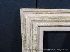 WHITE & GOLD-WASHED, W/ LINEN INLAY, CARVED WOODEN FRAME 17 X 19