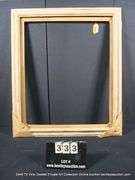 WHITE & GOLD-WASHED, W/ UNPAINTED WOOD, CARVED WOODEN FRAME 35 X 42