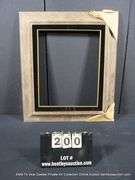 STAINED RUSTIC, W/ BLACK PAINTED VELVET & GOLD INLAY, CARVED WOODEN FRAME 25 X 29
