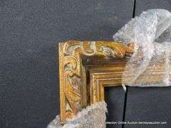 GOLD PAINTED, CARVED ORNATE WOODEN FRAME - (WRAPPED IN BUBBLE WRAP) 28 X 32