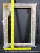 GOLD PAINTED, CARVED ORNATE WOODEN FRAME - (WRAPPED IN PLASTIC) 27 X 37