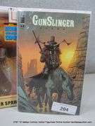 LOT: (2) GUNSLINGER SPAWN ACTION FIGURE & GUN SLINGER COMIC