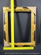 BLACK & GOLD PAINTED, CARVED ORNATE WOODEN FRAME 25 X 29