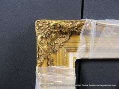 GOLD PAINTED, W/ LINEN INLAY, CARVED ORNATE WOODEN FRAME - (WRAPPED IN PLASTIC) 21 X 24