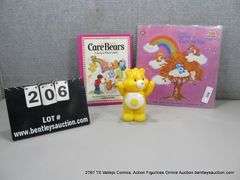 LOT: (3) CARE BEARS MERCH "CARE FOR YOU" VINYL, SUNSHINE BEAR & BOOK
