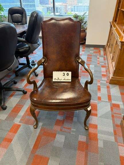 BROWN LEATHER ARM CHAIR