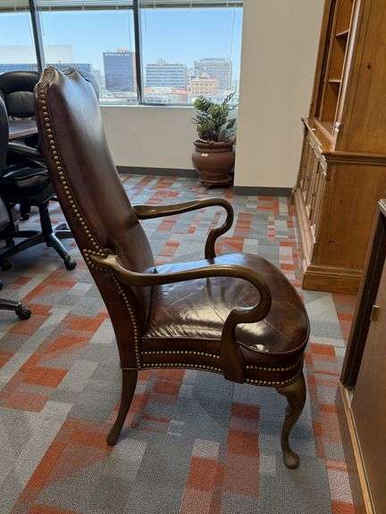 BROWN LEATHER ARM CHAIR