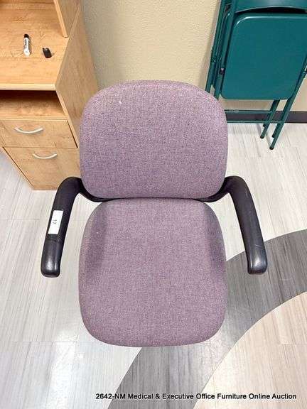 PURPLE ARM CHAIR ON CASTERS