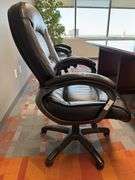 BLACK LEATHER ARM CHAIR W/ CASTERS